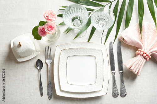 Elegant table setting with floral decor