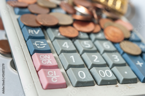 calculator coin bill cash smacker of Thailand selective focus at photo