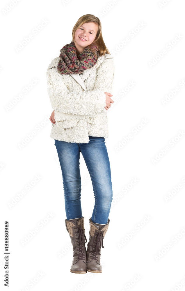 Young girl with blue jeans, winter jacket and boots standing pos Young girl with blue jeans, winter jacket and boots standing pos