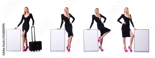 Young girl in black dress with poster and valise isolated on whi
