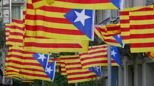 Freedom for Catalonia Independence Flagstaff.
Secessionist independence process politics in Catalonia.
Secessionist Catalonian flags of Spain unit.
Freedom independence for Catalonia.
 photo
