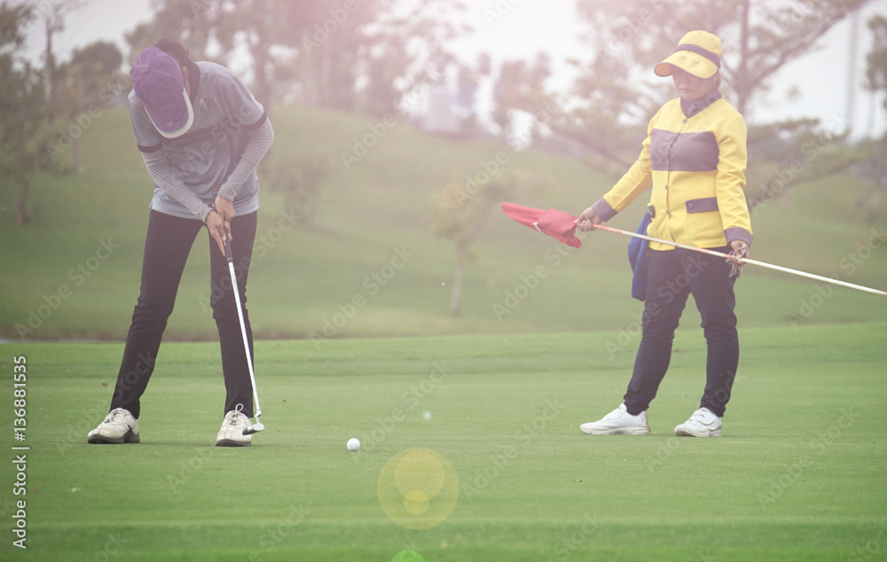 Fototapeta premium Women's golf is a sport that requires endurance.