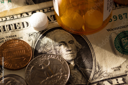 Pills and money prescription and medication cost for health care