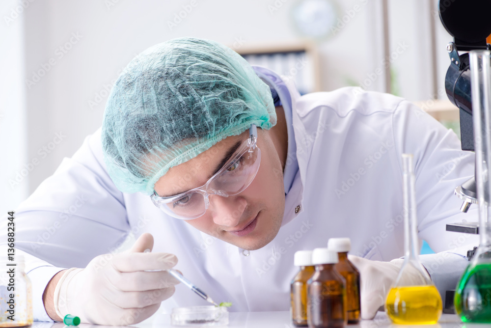 Pharmaceutical industry concept with scientist in the lab Pharmaceutical industry concept with scientist in the lab