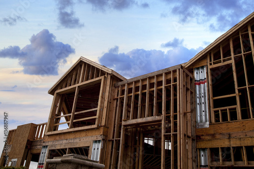 Vászonkép Wooden frame of a home being built