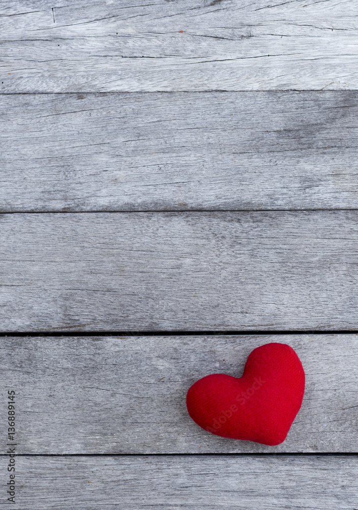 Red heart over old wooden floor background, vertical style, valentine background concept