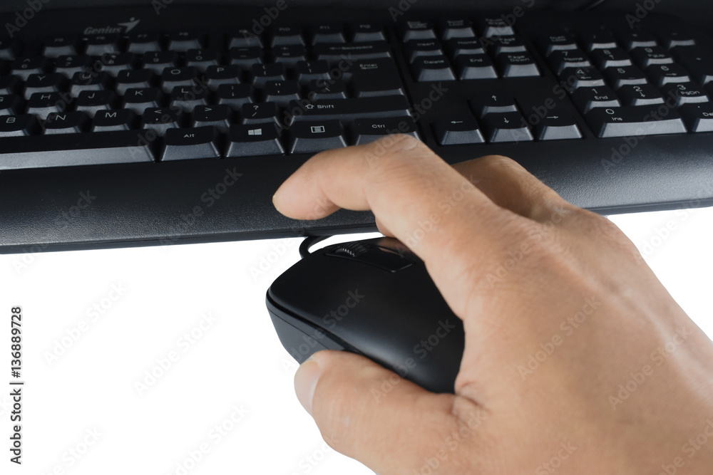 a hand holding computer mouse ready to click button a hand holding computer mouse ready to click button