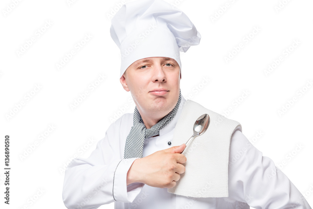 successful chef with a towel and a spoon on a white background successful chef with a towel and a spoon on a white background