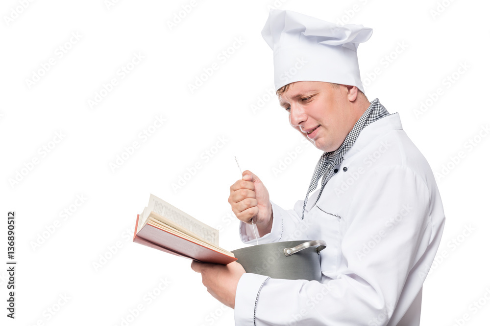 horizontal portrait of the cook with a pan and a book of recipes horizontal portrait of the cook with a pan and a book of recipes