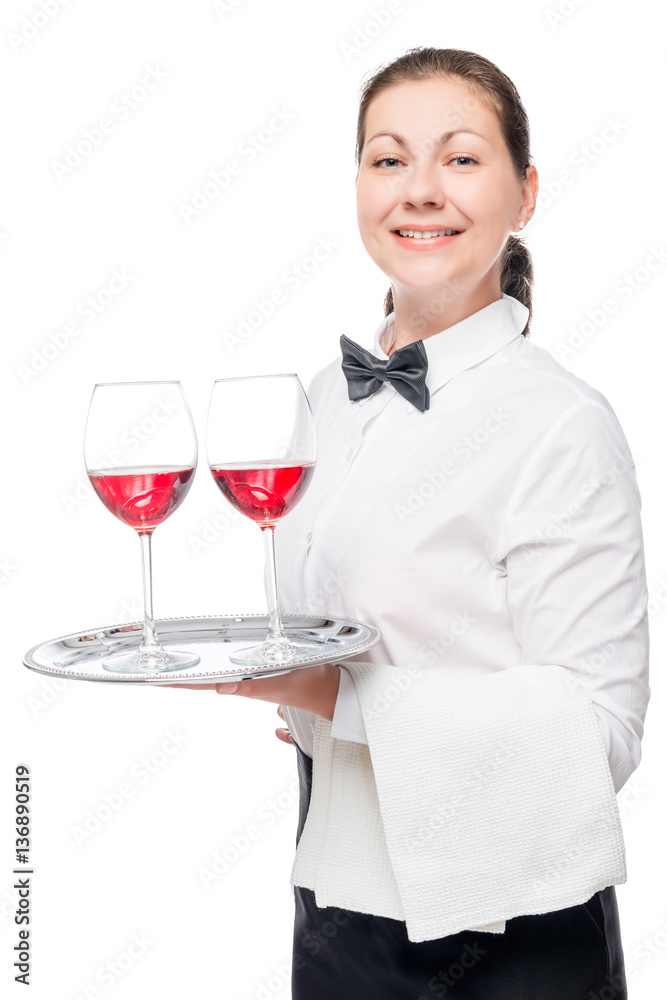 Vertical portrait of a waitress with alcoholic drinks on a tray Vertical portrait of a waitress with alcoholic drinks on a tray