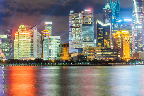 Landmarks of Shanghai with Huangpu river at night in China.