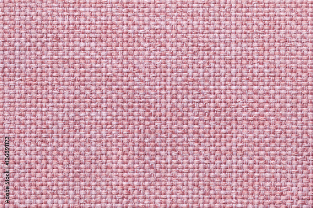 Pink background with checkered pattern, closeup. Structure of the fabric macro. Pink background with checkered pattern, closeup. Structure of the fabric macro.