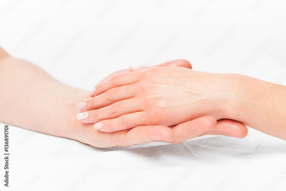 Professional hand massage in salon, close up hands