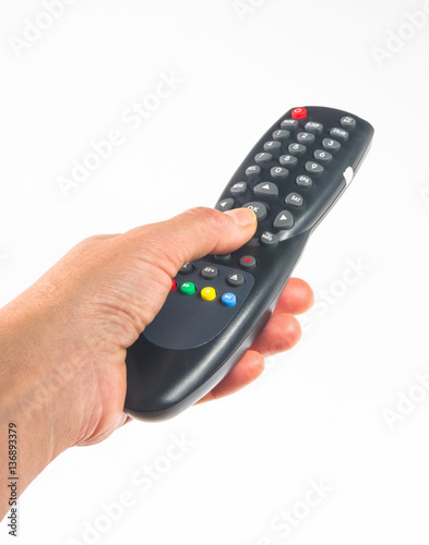 hand holding a remote control