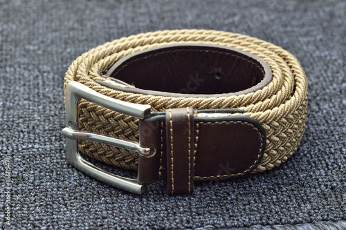 belts on fabric background.