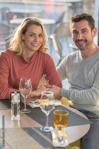 couple in love dating in restaurant