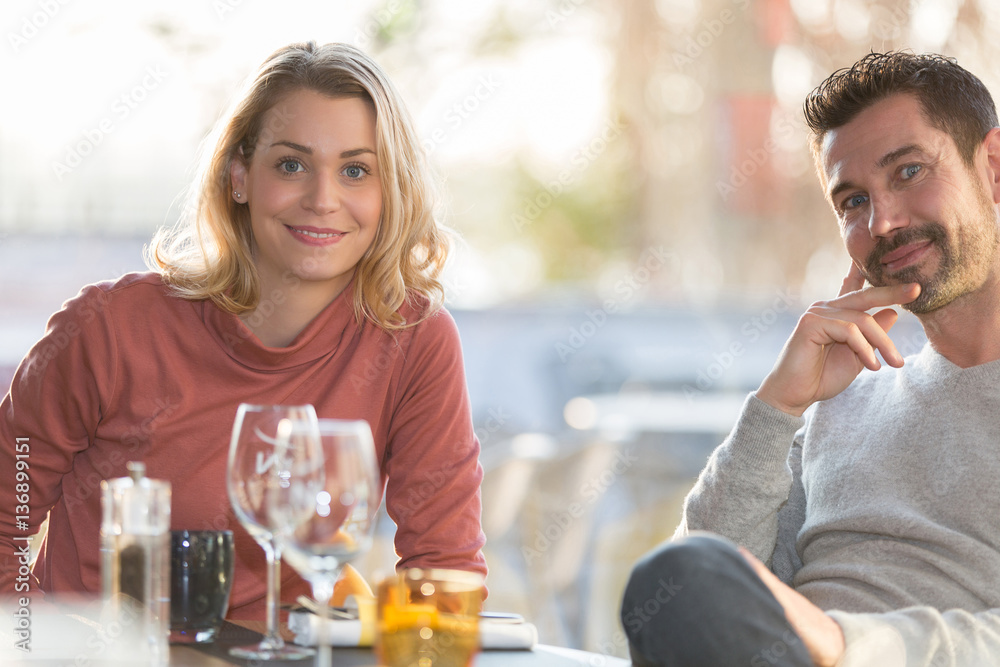 Young couple dating in restaurant Young couple dating in restaurant