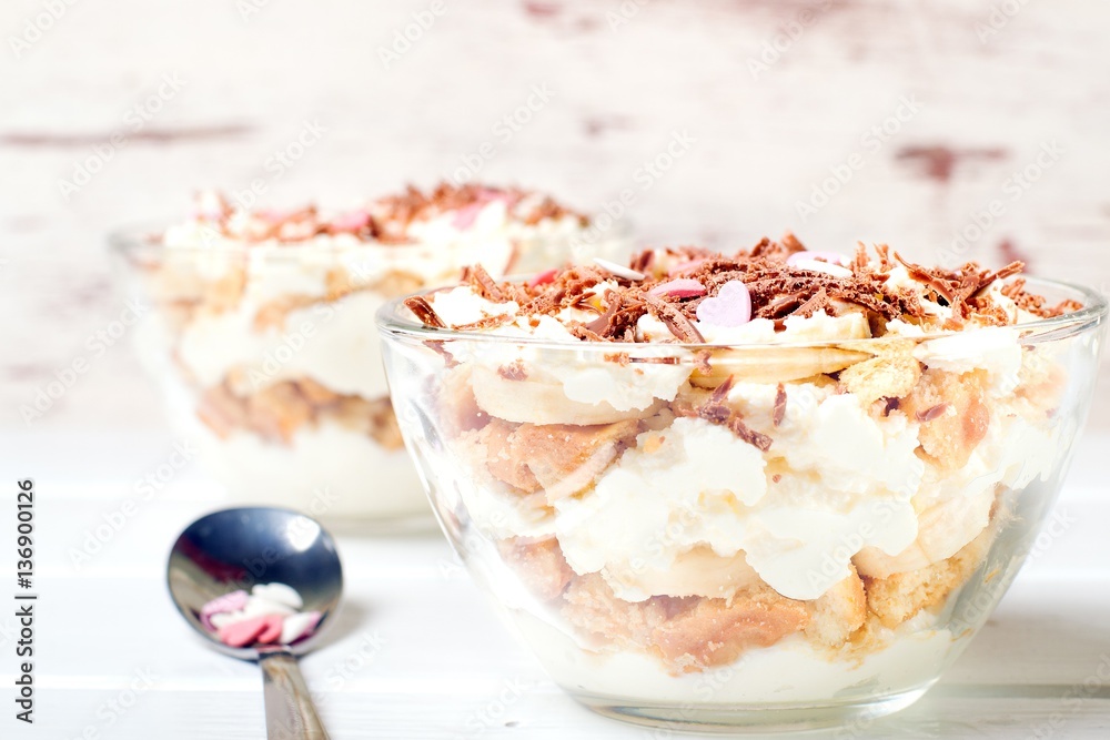 Cheesecake dessert in glass jar on wooden background. Healthy dessert. Healthy food concept. Cheesecake dessert in glass jar on wooden background. Healthy dessert. Healthy food concept.