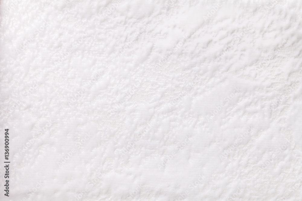 White background from a soft upholstery textile material, closeup. White background from a soft upholstery textile material, closeup.