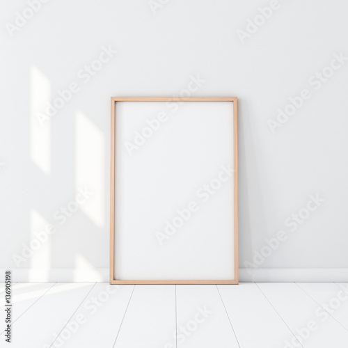 Wooden Frame with Poster Mockup standing on the white floor. 3d rendering
