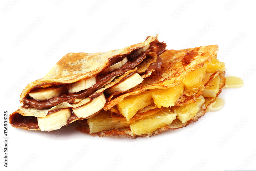 Delicious pancakes with banana and pineapple on white background Delicious pancakes with banana and pineapple on white background