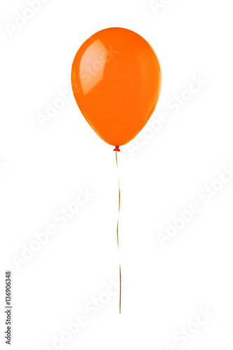 Orange flying balloon isolated on white background