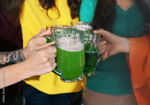 Friends with beer celebrati...