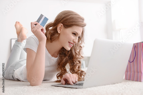 Young woman shopping online...