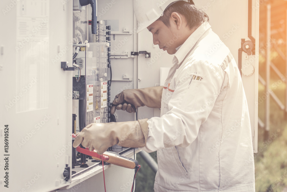engineer working on checking and maintenance equipment at green energy solar power plant engineer working on checking and maintenance equipment at green energy solar power plant