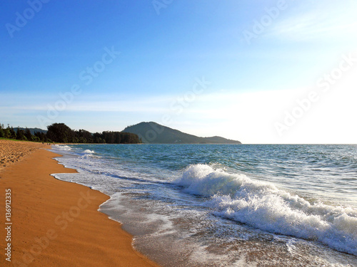 Sunny tropical beach with blue sky