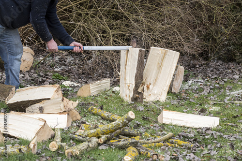 Man break wood with hammer photo