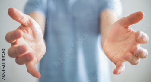 Businessman showing his empty hand photo