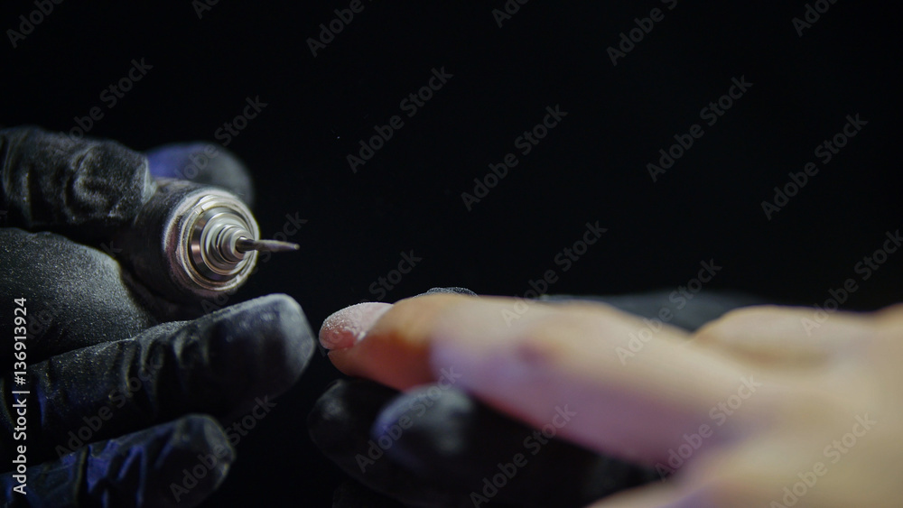 Manicure in beauty salon - fingers, nails and professional equipment Manicure in beauty salon - fingers, nails and professional equipment