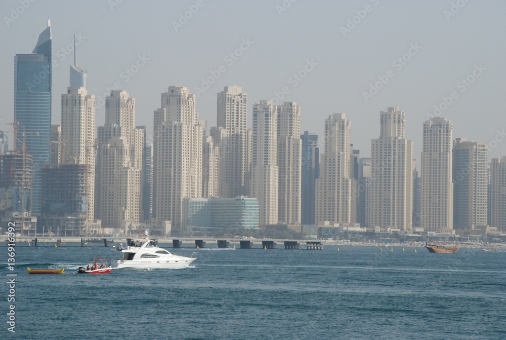 Dubai, United Arab Emirates,March 2015, Jumeirah, sunny day, the sea, a trip on a boat, canal, bridge, building, restaurant, hotel, tourism