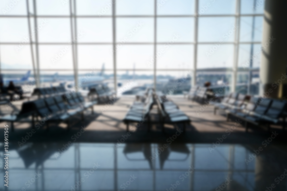 Blurred image of Departure lounge from airport terminal Blurred image of Departure lounge from airport terminal