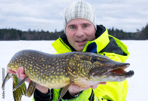 Record pike trophy under ice fishing