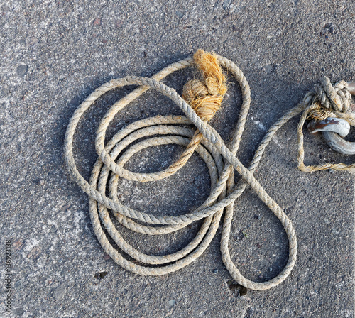 Rope made of hemp laying on the bridge