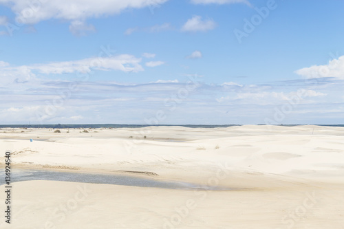 Fototapeta Naklejka Na Ścianę i Meble -  Water channel and Dunes in the Tavares beach