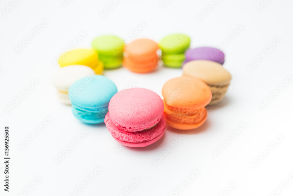 Tasty colorful macaroon on a white background (macaron, macarons, macaroon), Love concept. Tasty colorful macaroon on a white background (macaron, macarons, macaroon), Love concept.