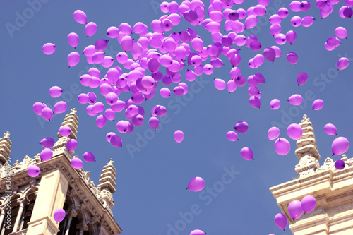 Balloons flying in sky in celebration
