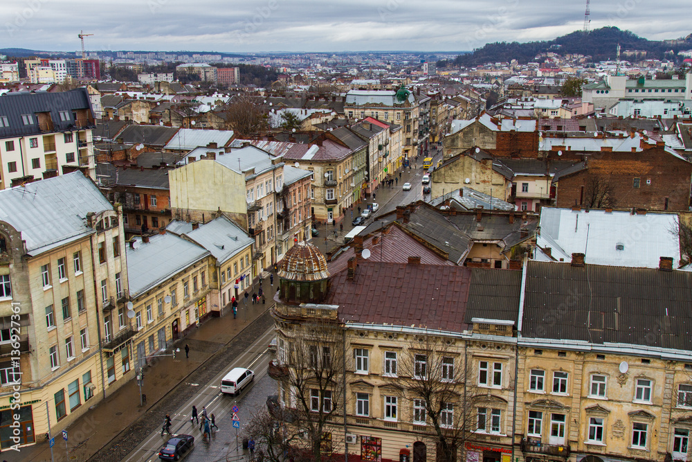Old Lviv in Ukraine. The view from the city hall of the city and the mountain High castle. February 2016