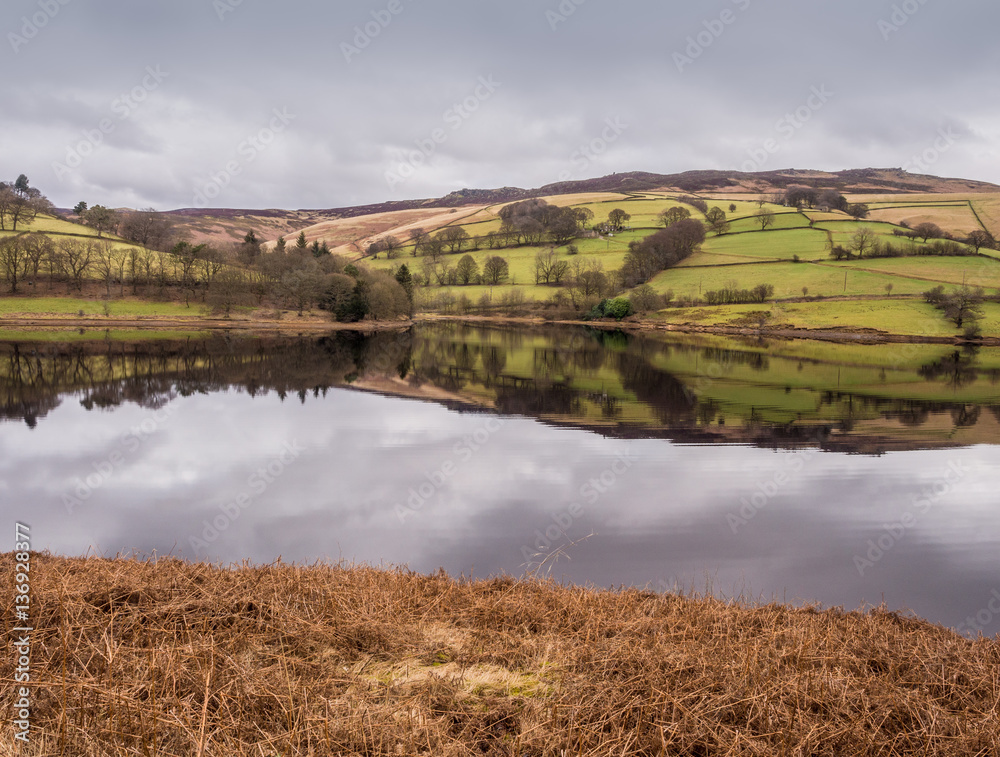 Amazing reflections and still waters on Ladybower Reservoir, Upper Derwent Valley, Derbyshire, UK