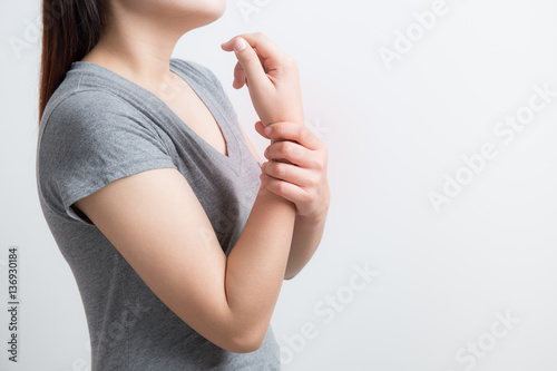 Photography Asian woman wrist pain.