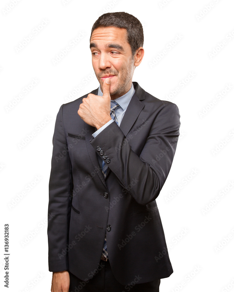 Young businessman doing a gesture of seduction Young businessman doing a gesture of seduction