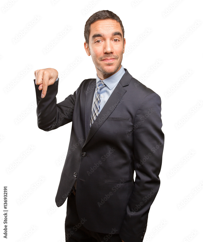 Happy young businessman pointing Happy young businessman pointing