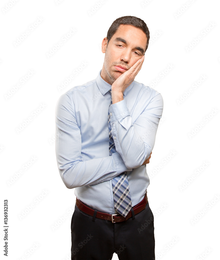 Stressed young businessman overworked Stressed young businessman overworked