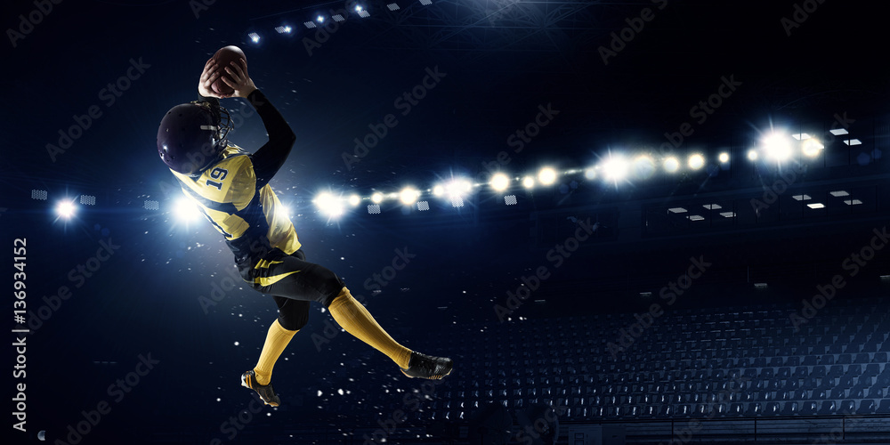 Naklejka premium American football player . Mixed media