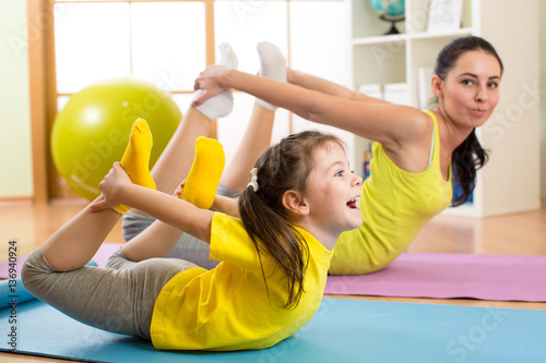 Mother and kid in the gym c...