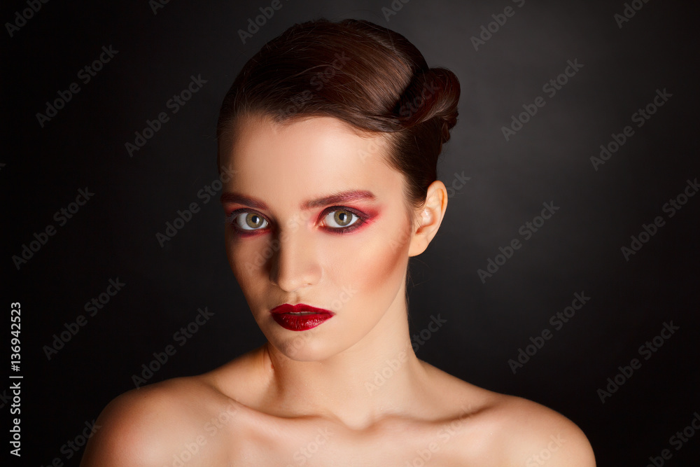 Portrait of beautiful sexy fashion model with red make up over d Portrait of beautiful sexy fashion model with red make up over d