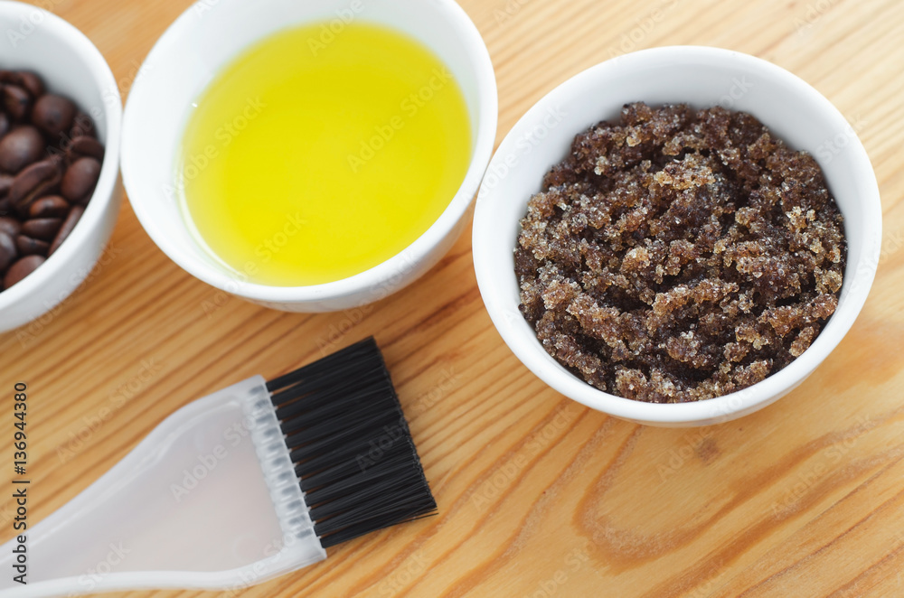 Homemade sugar, olive oil and ground coffee face and body scrub. DIY cosmetics Homemade sugar, olive oil and ground coffee face and body scrub. DIY cosmetics